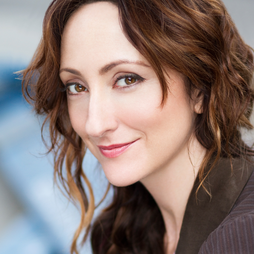 Carmen Cusack as Sally Adams